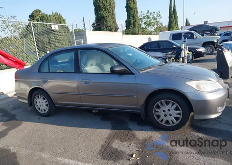 2004 Honda Civic Lx z USA, uszkodzony, nr VIN 2HGES16594H542841